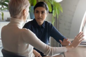 Two professionals having a conversation